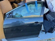 OEM Front Left Door from a 2015 Cadillac SRX, Charcoal Gray 