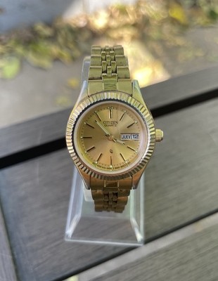 Citizen CQ Watch Women 25mm Champagne Dial Gold Tone Daydate 1002-R15101 NewBat