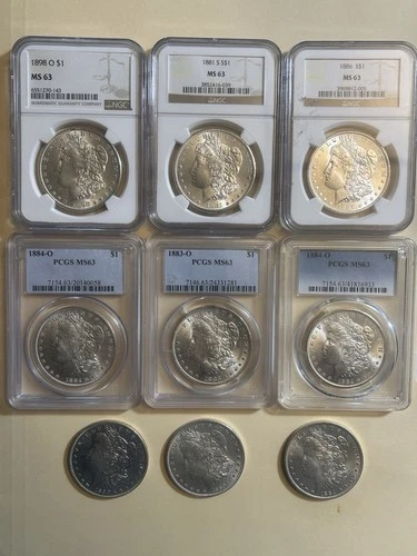 LOT OF (9) MORGAN SILVER DOLLARS 6 OF MS63 & 3 UNC UNGRADED 90% SILVER 🔥🔥📈📈
