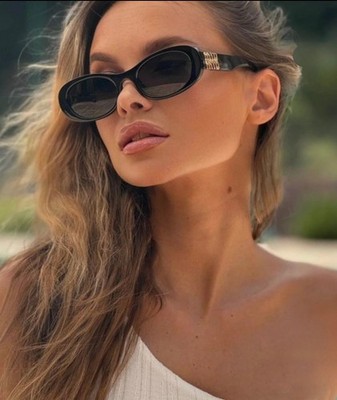 Miu Miu MU06ZS 1AB5S0 Oval Sunglasses in Black /Gray Lens 100% UV