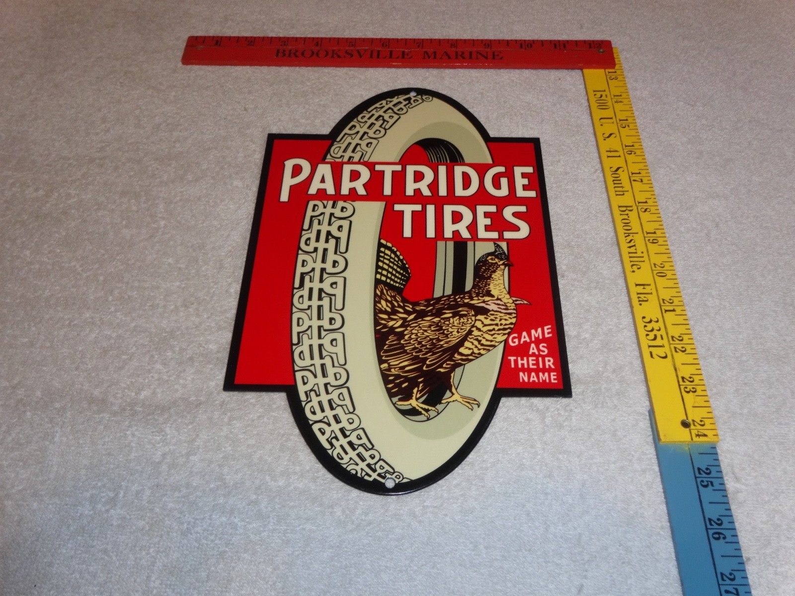 VINTAGE "PARTRIDGE TIRES" W/ HEN / ROOSTER 12" METAL TIRE GAME GASOLINE OIL SIGN