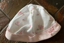 Beautiful white and pink newborn hat for baby girl