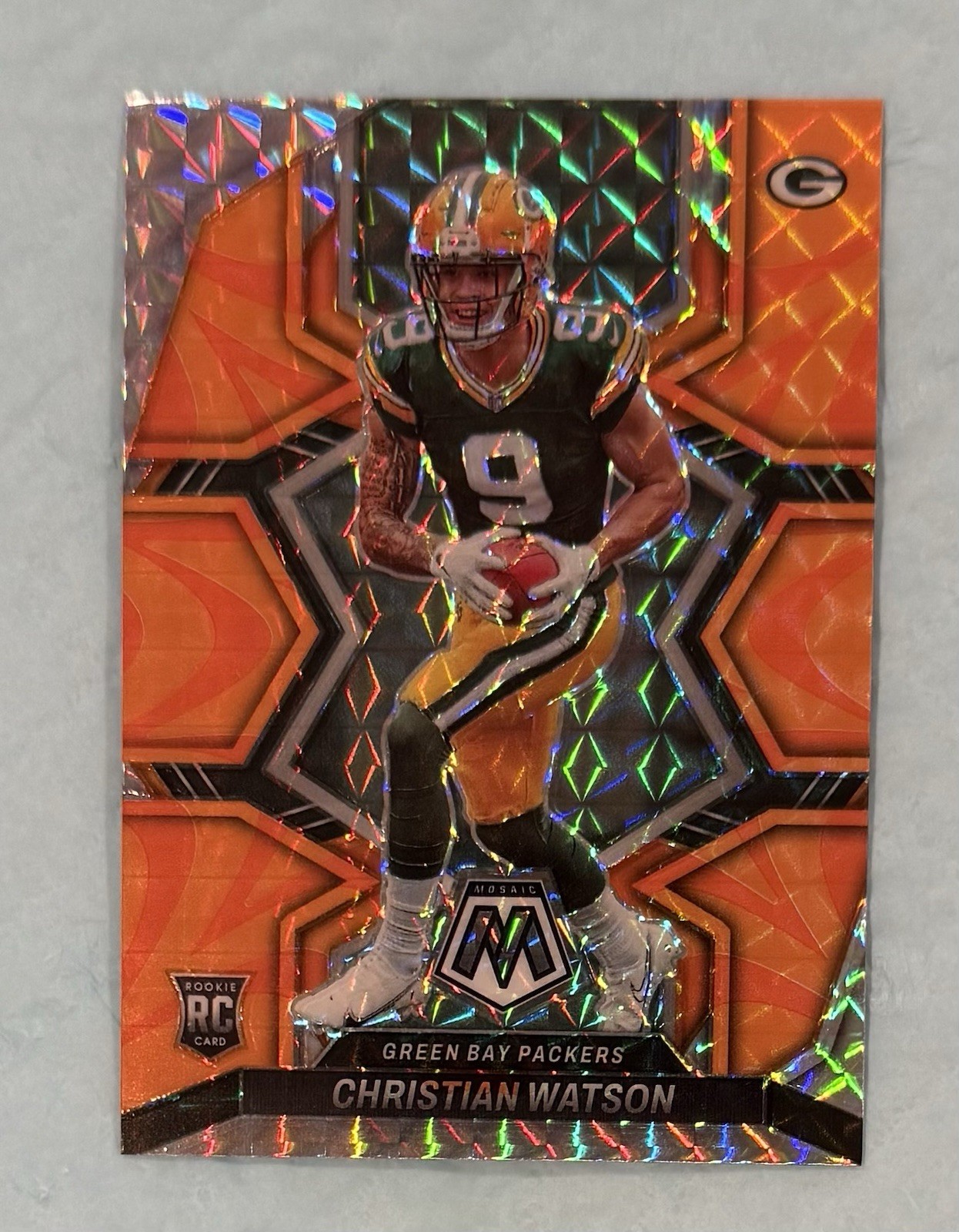 2022 Panini Mosaic Christian Watson #327 Mosaic Reactive Orange Prizm (RC)