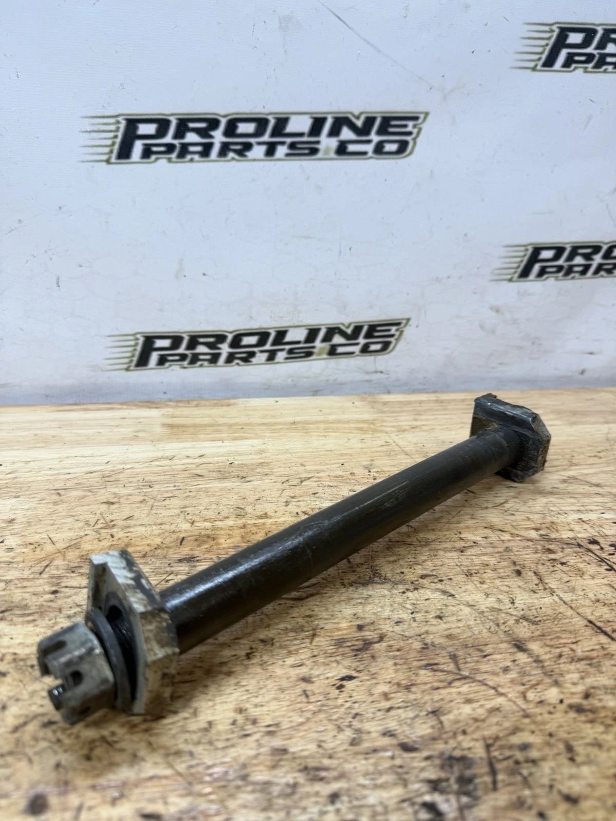 01 - 07 SUZUKI RM 125 COMPLETE REAR WHEEL AXLE SHAFT NUT BLOCKS