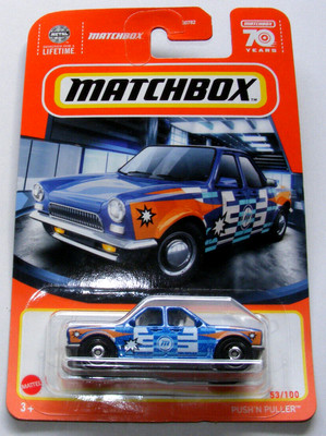 Matchbox Push ´N Puller 1/64 Diecast Modellauto US Großbild Verpackung Schrift