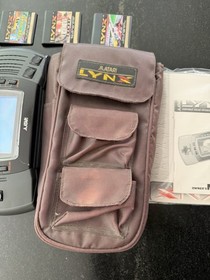 Atari Lynx Handheld System w/ Games Tested And Working Bags Manual