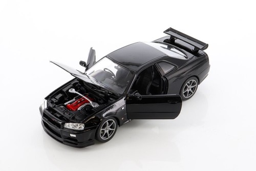 NISSAN SKYLINE GT-R (R34) 1/24 scale DIECAST CAR WELLY 24108/4D - Picture 3 of 5