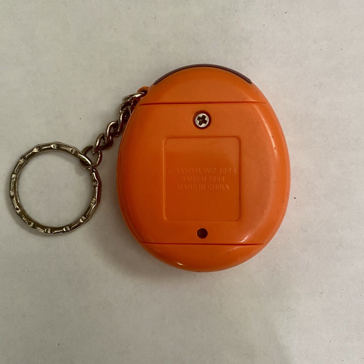 2004 Bandai Tamagotchi Connection V3 Imprimé zèbre noir et blanc avec touches d'orange et de vert - Canada
