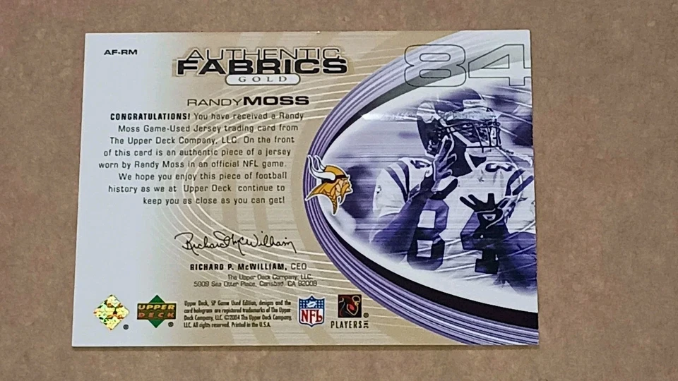 2004-UPPER DECK SP-RANDY MOSS AUTHENTIC FABRICS GOLD JERSEY-/100-VIKINGS - Image 2 of 4
