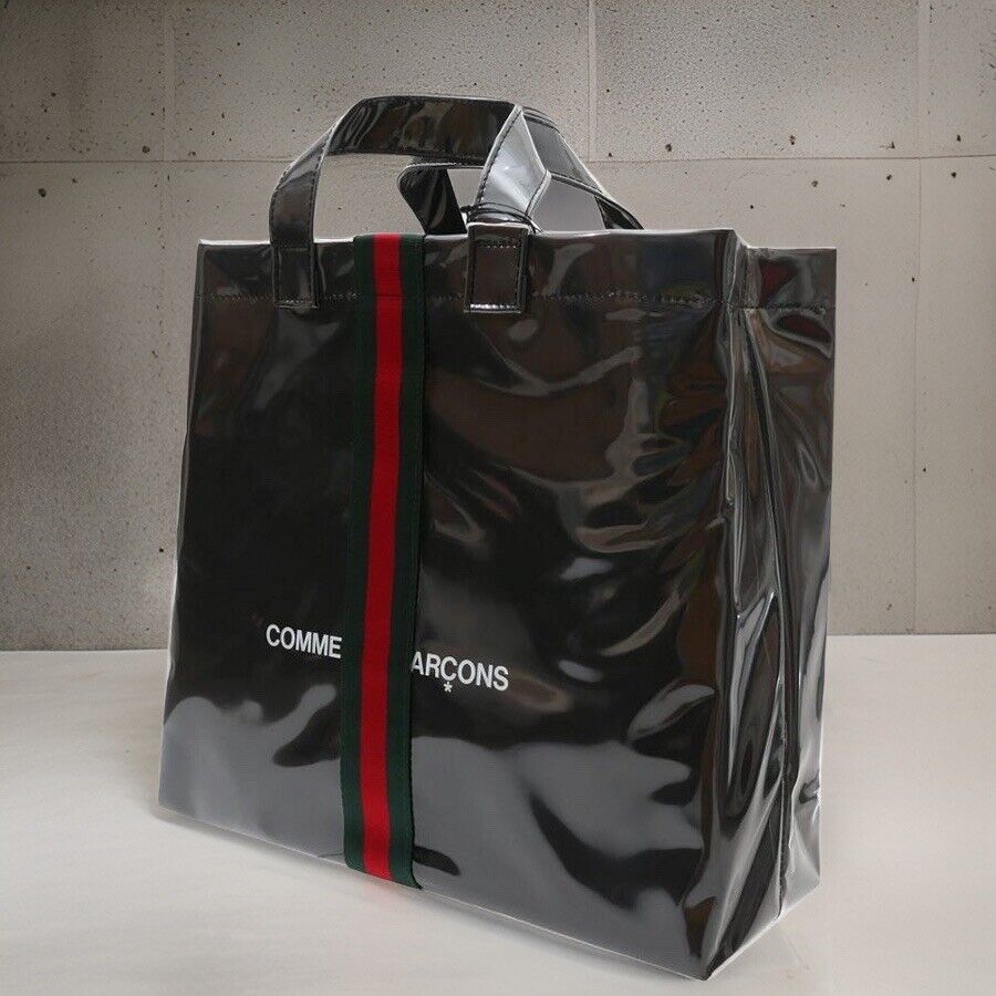 Comme Des Garcons × Gucci Black Web Stripe Paper Plastic PVC Comme Des Garcons × Gucci Black Web Stripe Paper Plastic PVC