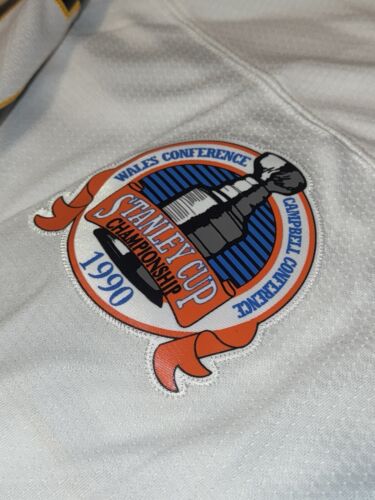 Camiseta deportiva Ray Bourque Boston Bruins 89-90 Mitchell & Ness NHL retro línea azul 5XLT - Imagen 8 de 15