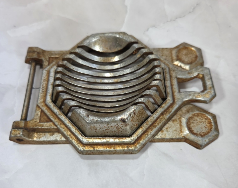A German wire egg slicer with the sturdy, satisfying form that modern plastic versions have completely lost — a retro kitchen staple that still earns its counter space.