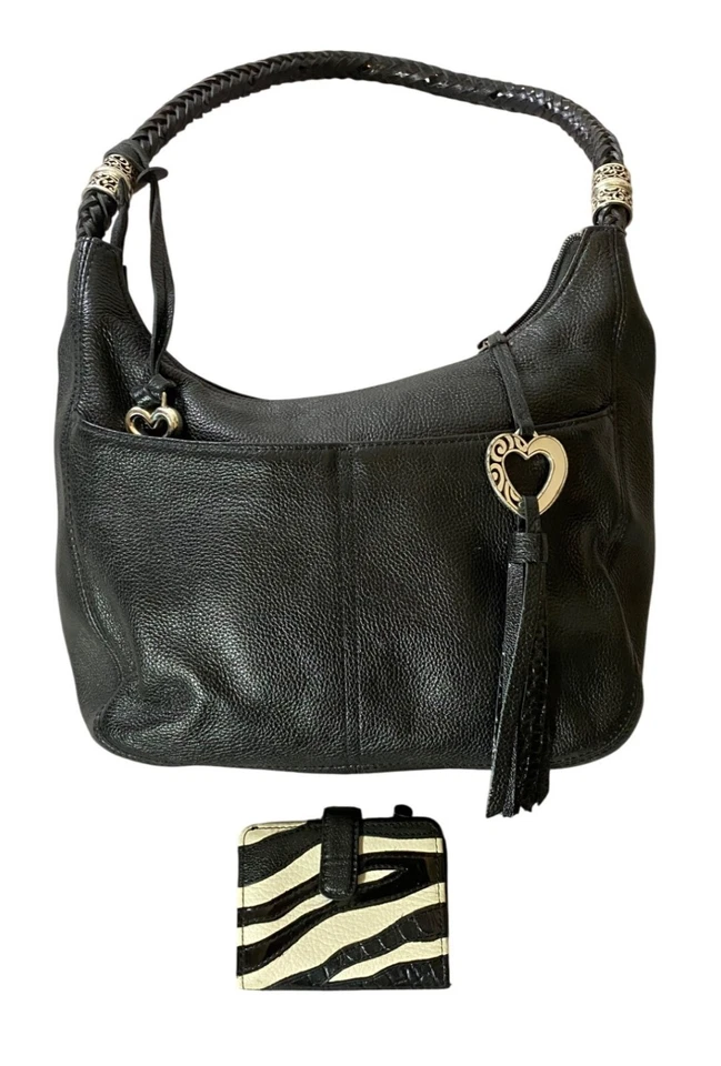 Bolso de hombro Brighton de cuero granulado negro con correa trenzada y billetera con estampado de cebra