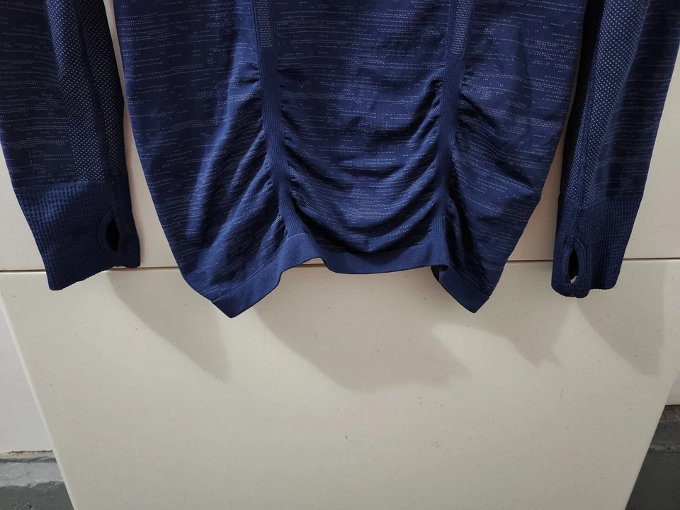 Top Athleta para mujer S azul vía rápida 1/4 cremallera acanalada manga larga ojo espaciado elástico Foto 2 de 4