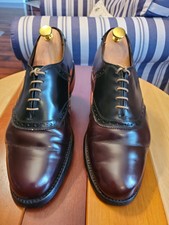 cordovan and black saddle shoes