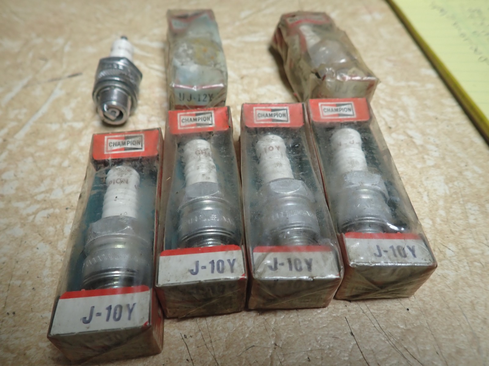 New NOS Champion Spark Plug Lot Four J-10Y one each L10 UJ-12Y UJ6