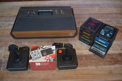 Atari 2600 4 Switch system console w/ 10 games joysticks works 100%!