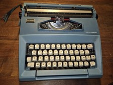 Machine à écrire SMITH-CORONA Courier - BLEU - Mécanique OK -  Valise Cassée