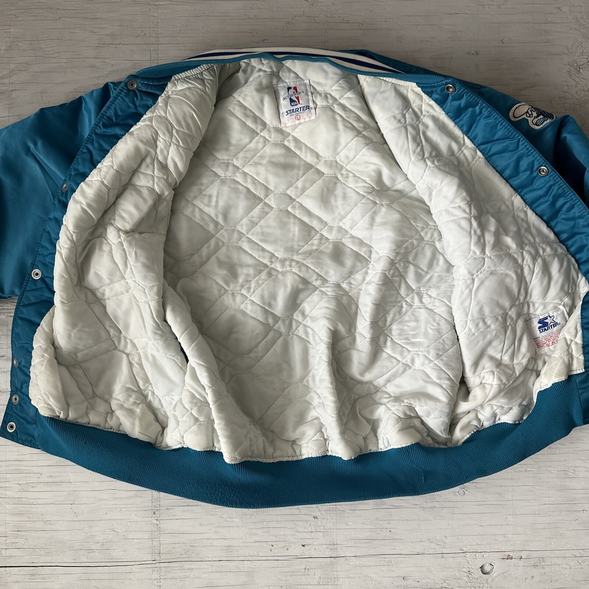Vintage 90s NBA Starter Charlotte Hornets spellout Satin Vintage 90s NBA Starter Charlotte Hornets spellout Satin