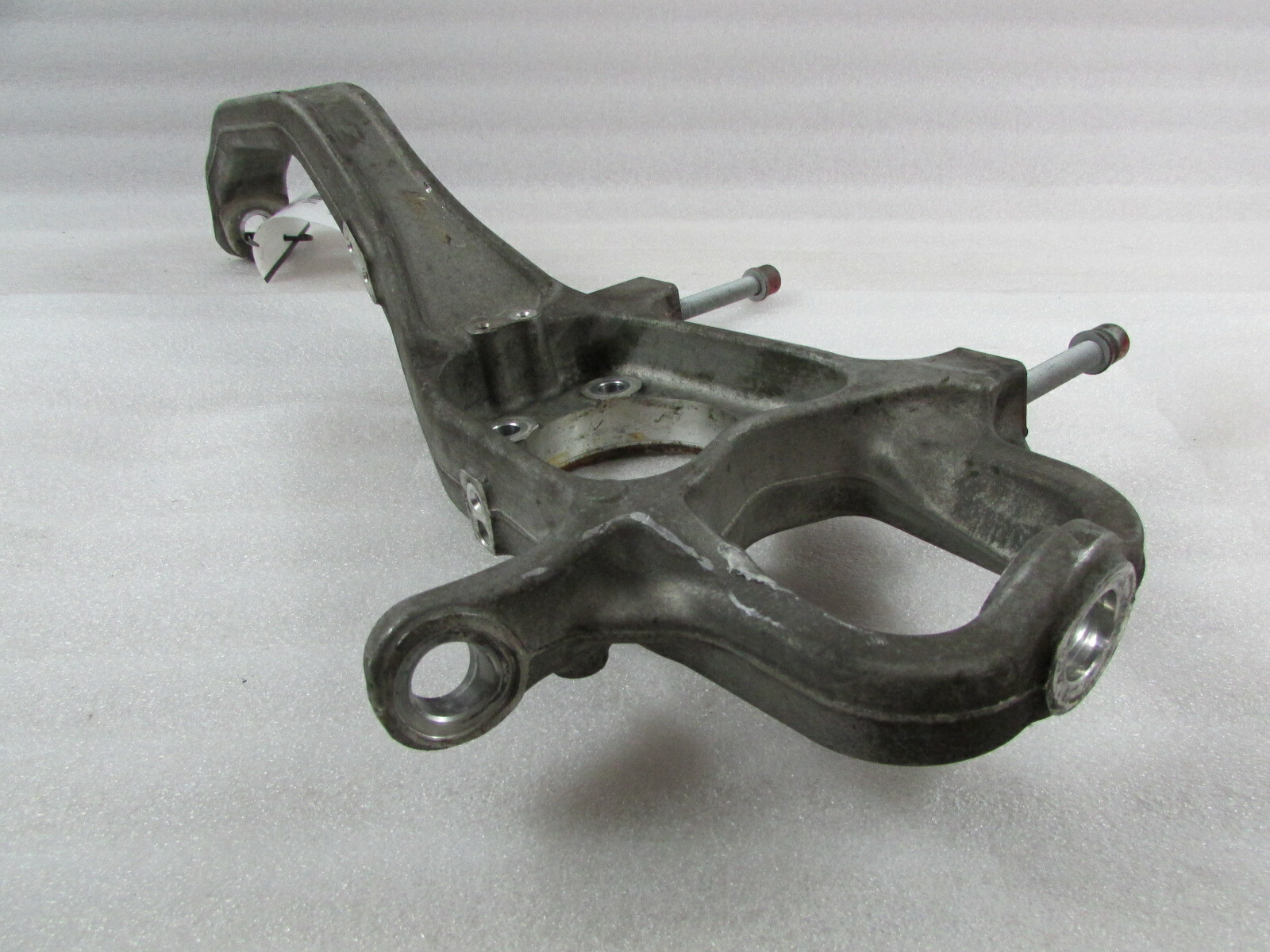 Maserati Ghibli, Left Front Spindle/Knuckle Upright, Used, P/N 670003576