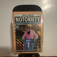 2025 Panini Mosaic Travis Hunter Notoriety Rookie Prizm Insert #12 Jaguars