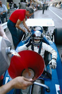 Jean Pierre Beltoise Matra MS120 is fuelled up in pits before sta- 1970 Photo