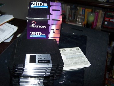 A box of twenty  one 3.5'' 1.44MB  Floppy Disks Black  unformatted for PC or Mac