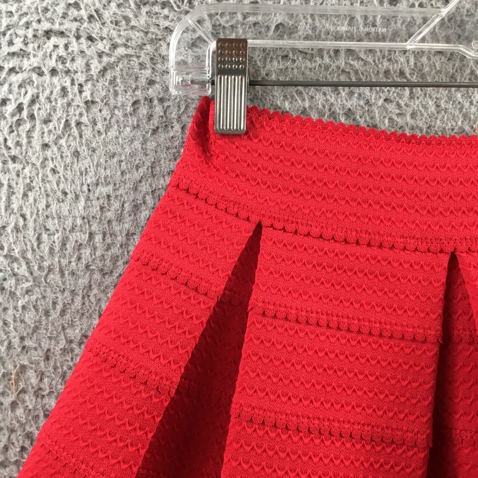 Minifalda Express línea A texturizada plisada para mujer M cintura elástica tirar informal Foto 2 de 4