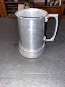 metal beer mug with glass bottom