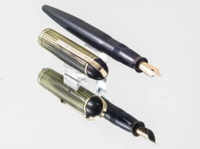 1943 WAHL EVERSHARP SKYLINE WITH LAMINATED GREEN CELLULOID CAP - 14K FINE NIB