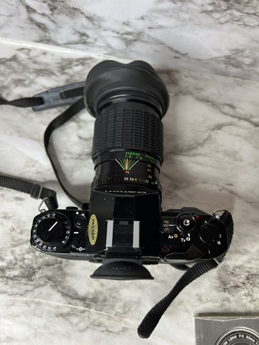 Canon A-1 analoge Kleinbildkamera mit ZYKKOR 62mm UV-Objektiv, Handbuch und Tasche - Bild 7 von 15