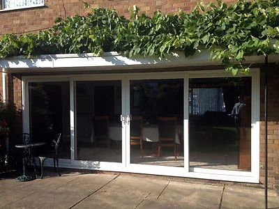 uPVC Sliding 4-Pane Inline Patio Doors | White, Oak, Mahogany, Rosewood (#125) - Image 1 of 4