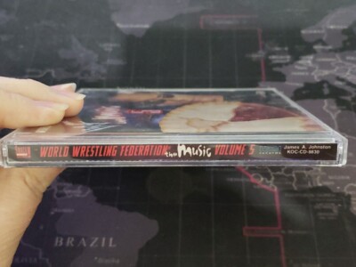 WWE Music CD Dwayne Rock Johnson Triple H Kane Chyna Kurt Angle