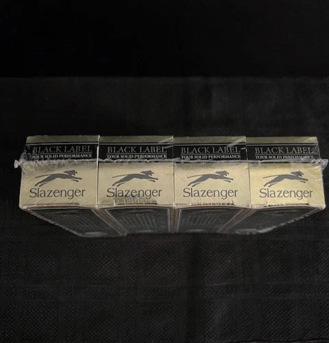 Pelotas de golf Slazenger de colección etiqueta negra una docena de gira rendimiento sólido Foto 3 de 3