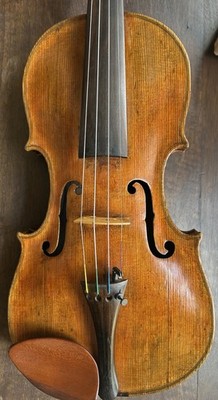 Old Violin labeled Petrus Guarnerius Filius Joseph