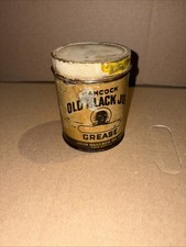 ANTIQUE JOHN HANCOCK OIL CO OLD BLACK JOE AXLE GREASE TIN (HALF FULL)