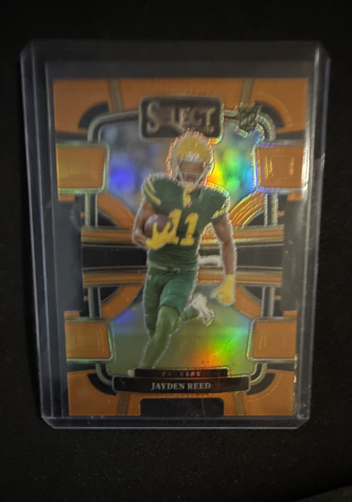 2023 Panini Select - Concourse Jayden Reed #38 Orange Prizm Die-Cut /499 (RC)
