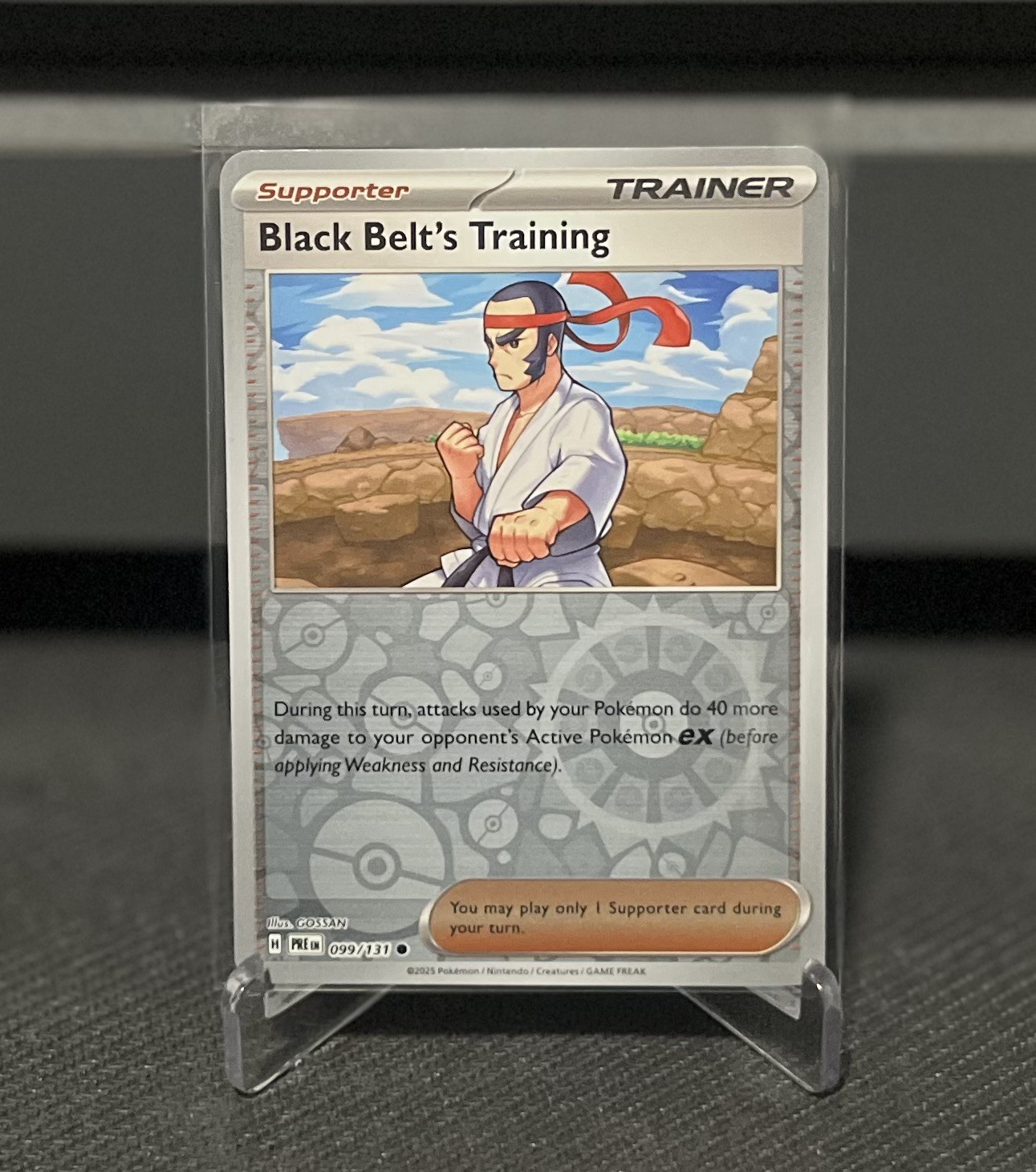 Reverse Holo Black Belt's Training 099/131 - Pokemon Prismatic Evolutions NM