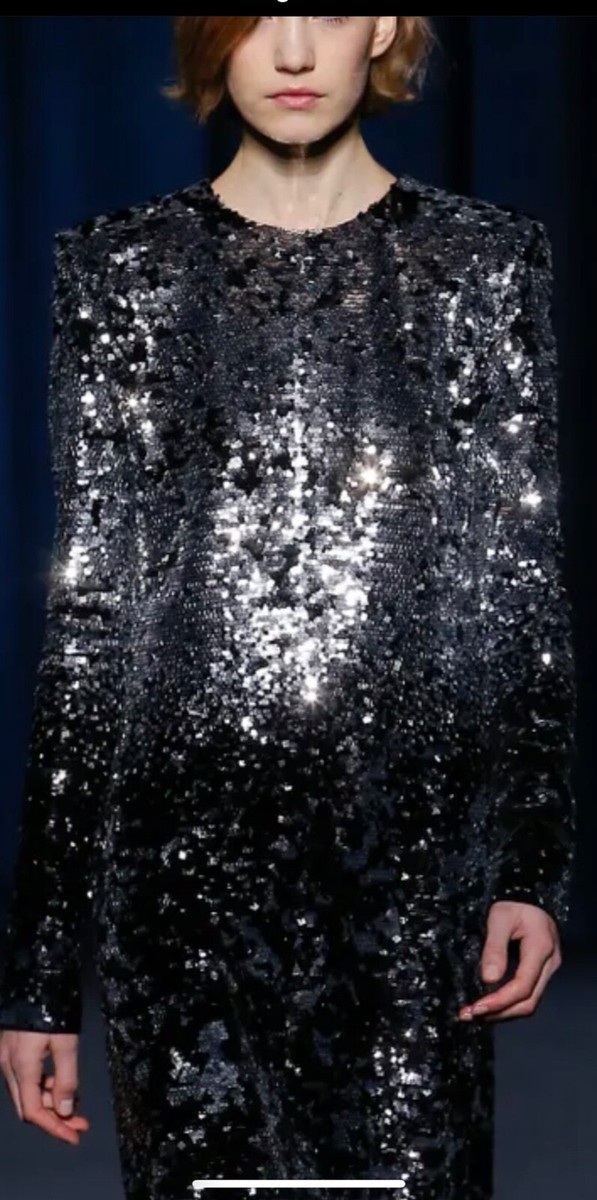 givenchy silver dress The Givenchy [ @givenchy ] Fall Winter 2024 collection opened with a  hand-embroidered silver cocktail dress with a narrow train, densely  embellished in its entirety with silver bugle beads. An archival cat