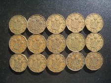 Fifteen George VI Brass Threepences 1937.