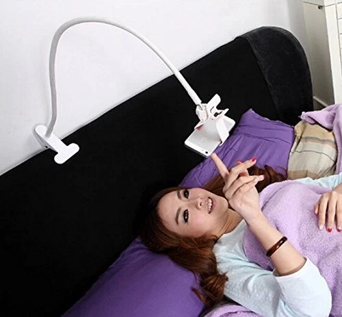 Phone holder for bed outlet