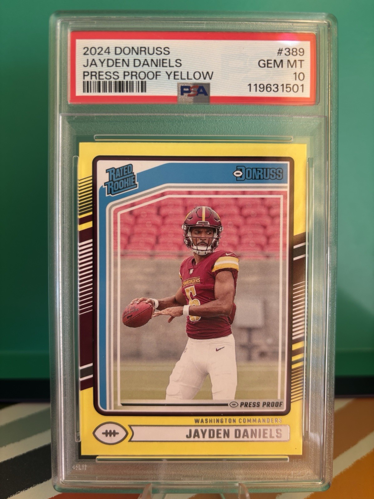 2024 Panini Donruss Rated Rookie Jayden Daniels RC 389 Press Proof Yellow PSA 10