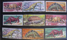 Dinosaurs Stamps Fujeira Fujairah, UAE precanceled unused OG lot of 9, 1968