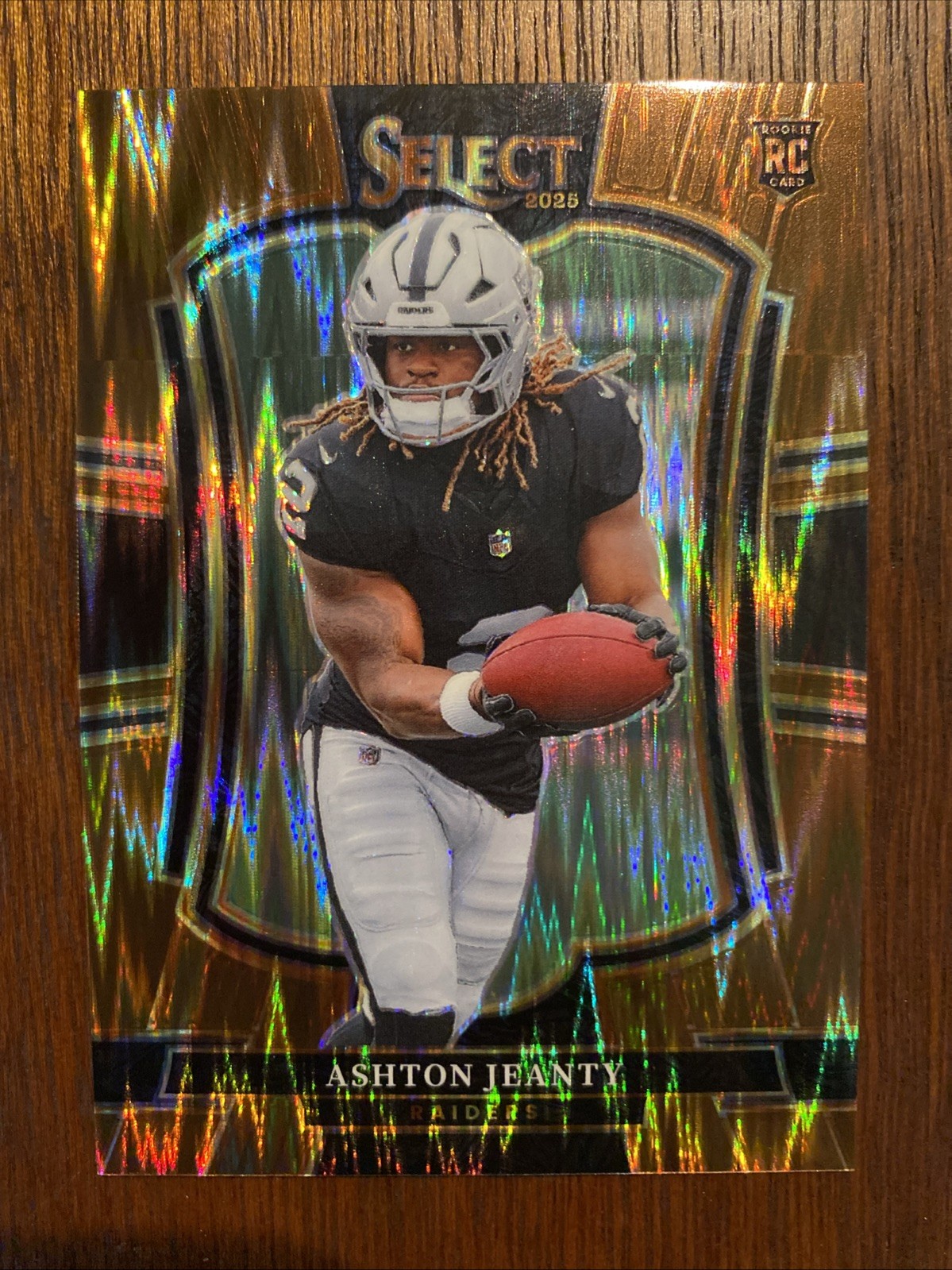 2025 Panini Select Ashton Jeanty Premier Level #104 Copper Shock Prizm RC /899
