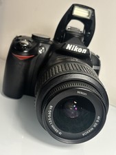 Nikon D3000 DSLR Camera + 18-55mm DX  1/3.5-5.6 G Lens + MC, Charger + D/Cable