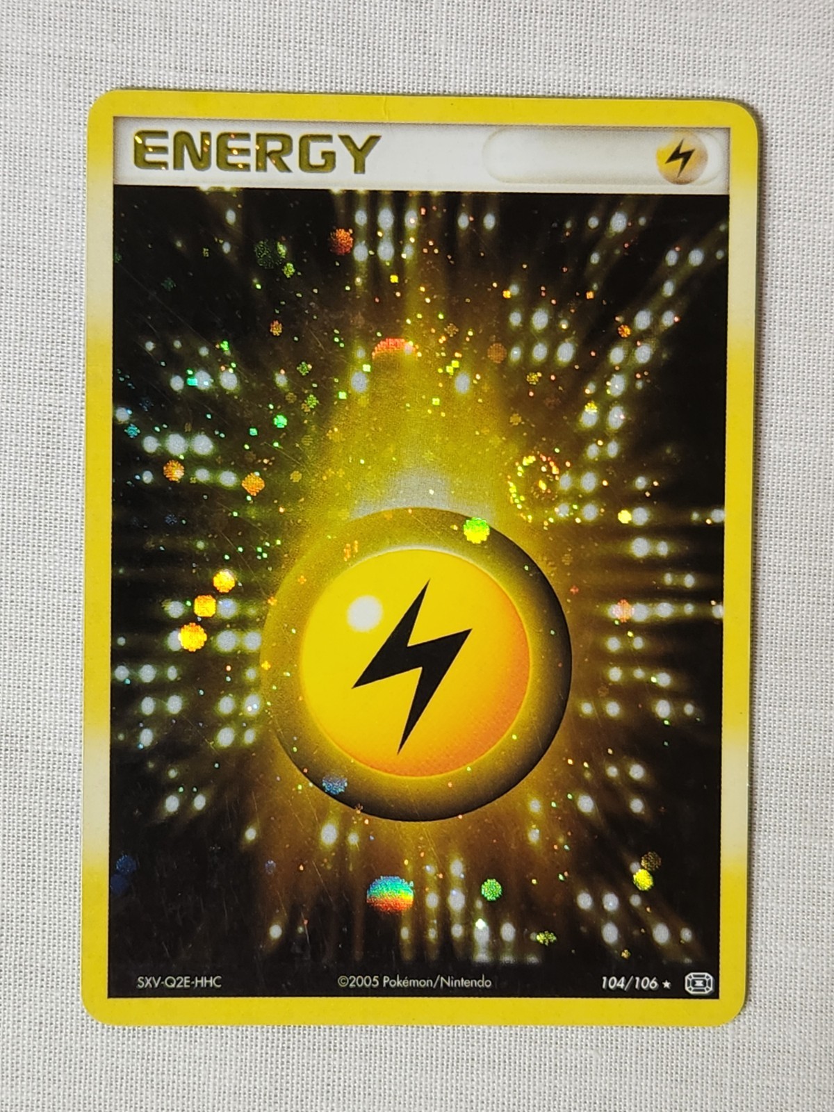 Played Lightning Energy - Holo Swirl 104 Emerald Pokemon TCG