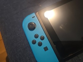 Nintendo Switch 32GB Gray Console with Neon Red and Neon Blue Joy-Con