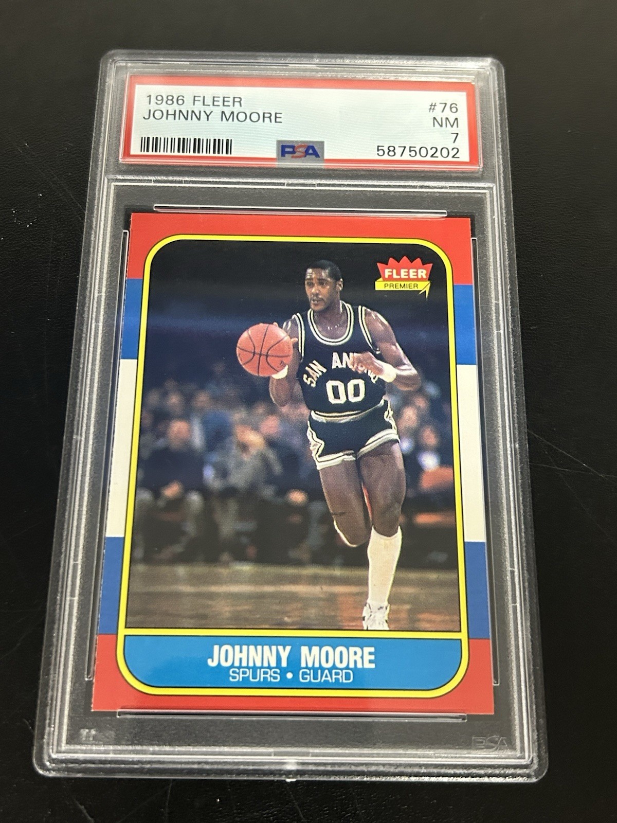 1986 Fleer Johnny Moore #76 PSA 7 Near Mint San Antonio Spurs