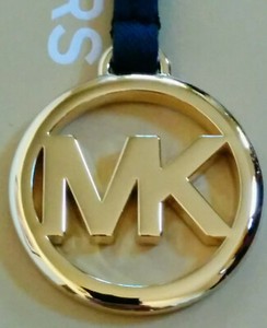 michael kors emblem