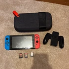 Nintendo Switch Console PAL Neon Red/Blue Joy-Con Bundle Carry Case & 3 Games